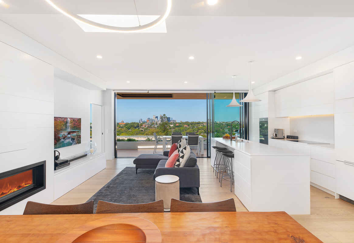 Luxury Penthouse Apartment with Magnificent Views and Rare 5 Car Garage